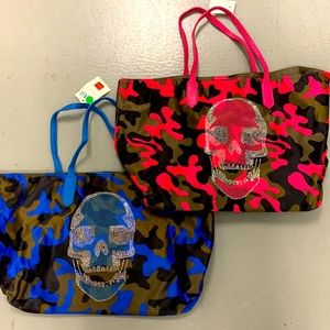 Fun, rhinestone camo and skull bags. Very trendy. Blue one available only.